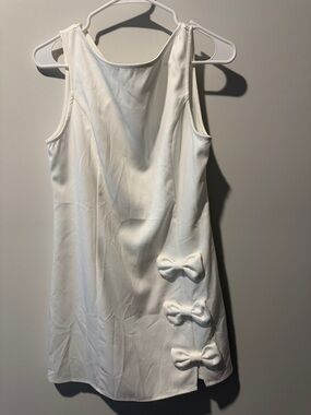Cider White Sleeveless Mini Dress with Side Bow Accents